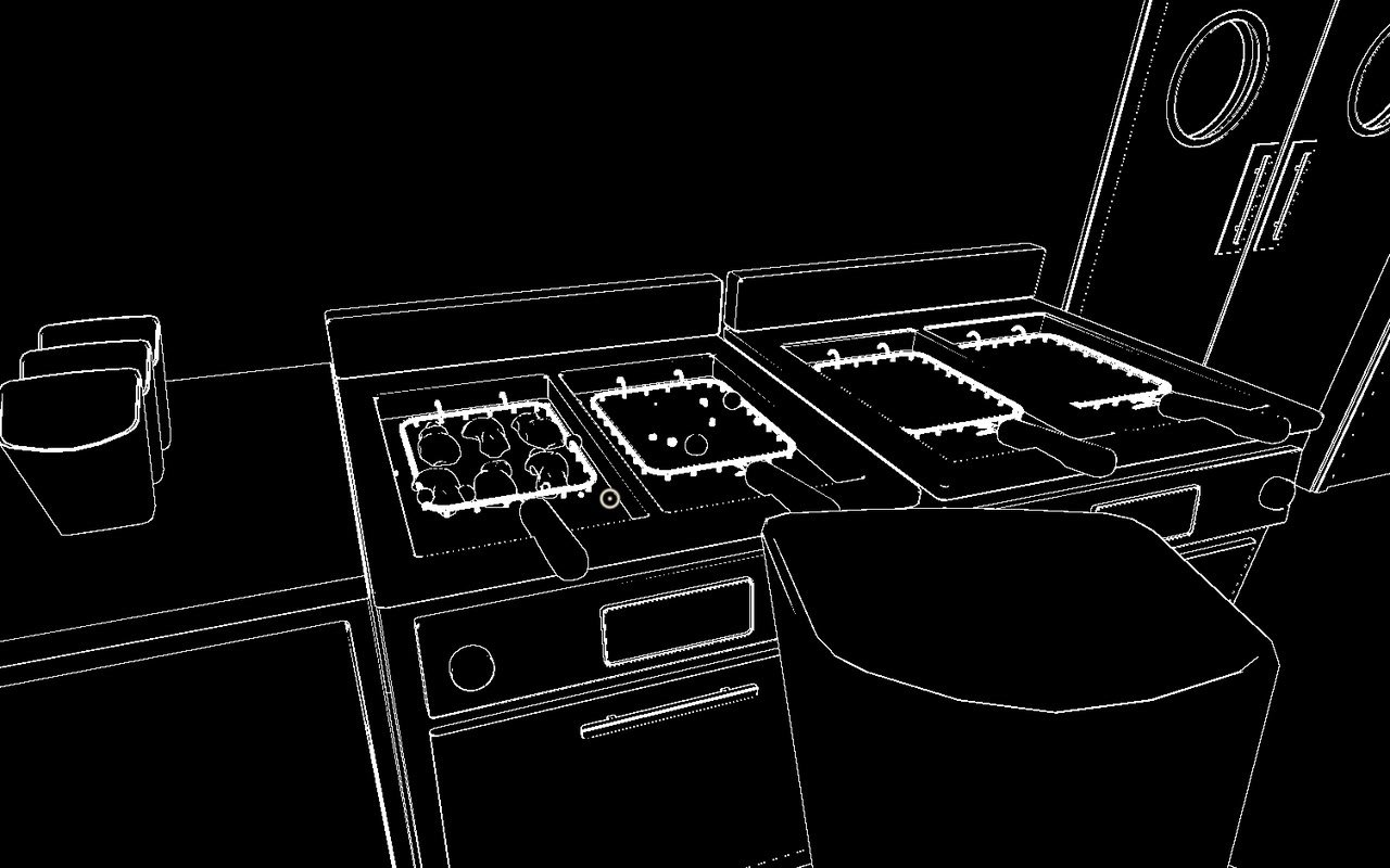 The Chef's view of the fryers: white outlines on black, with food in the baskets